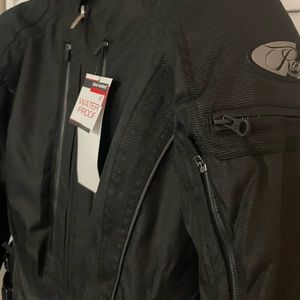 Two new Joe Rocket women’s motorcycle jackets, new with sale tags.